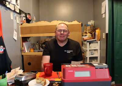 Brian working cash register at Sullivans Diner in Hudson Falls